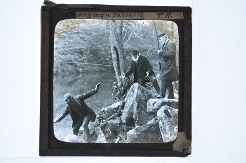 Men fishing river - men, gaffing